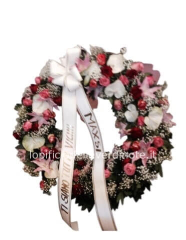 Corona funebre colore tonalità rosa.
